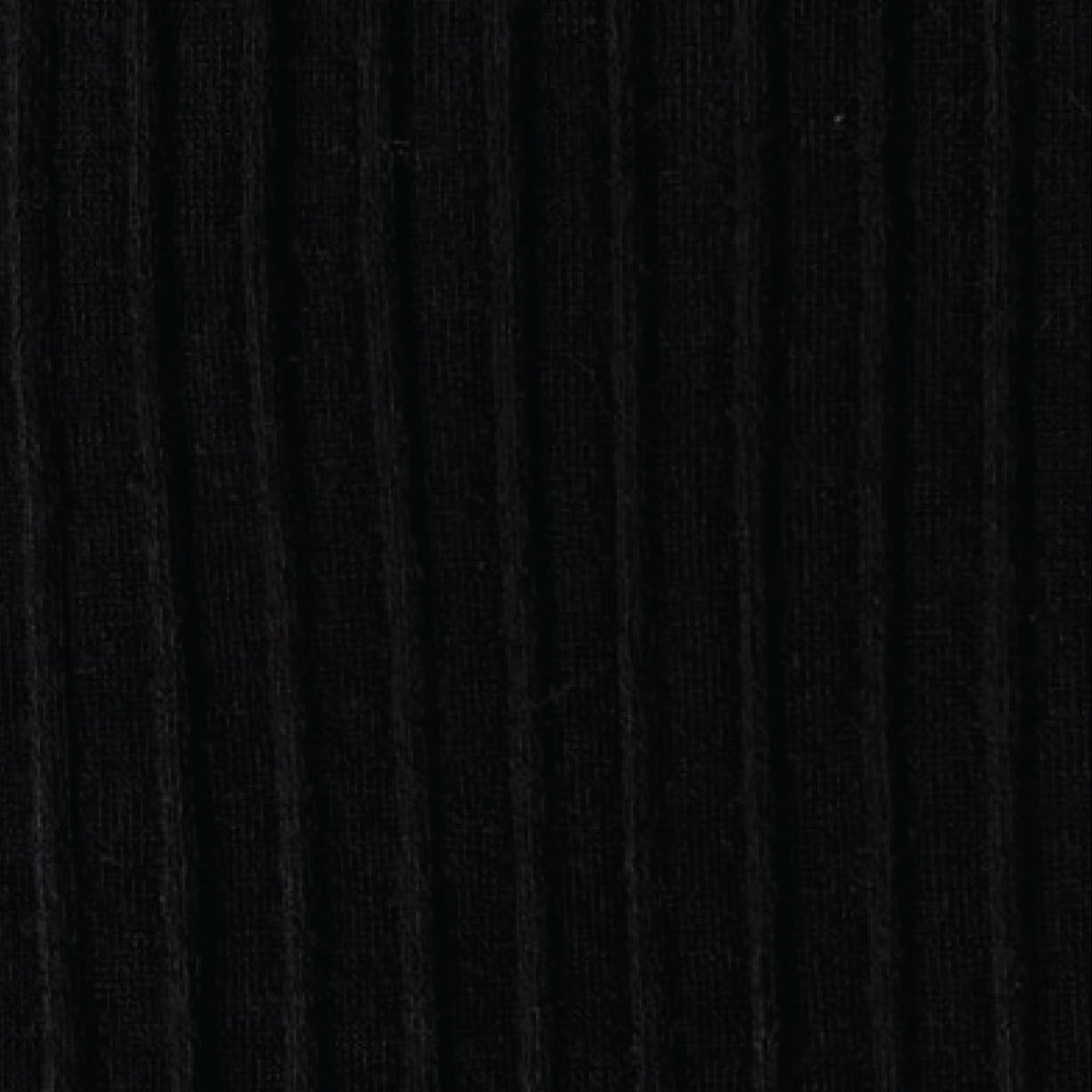 A close-up of black ribbed tights